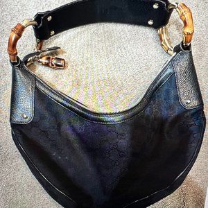 Black Gucci print hobo style shoulder bag with bamboo handles